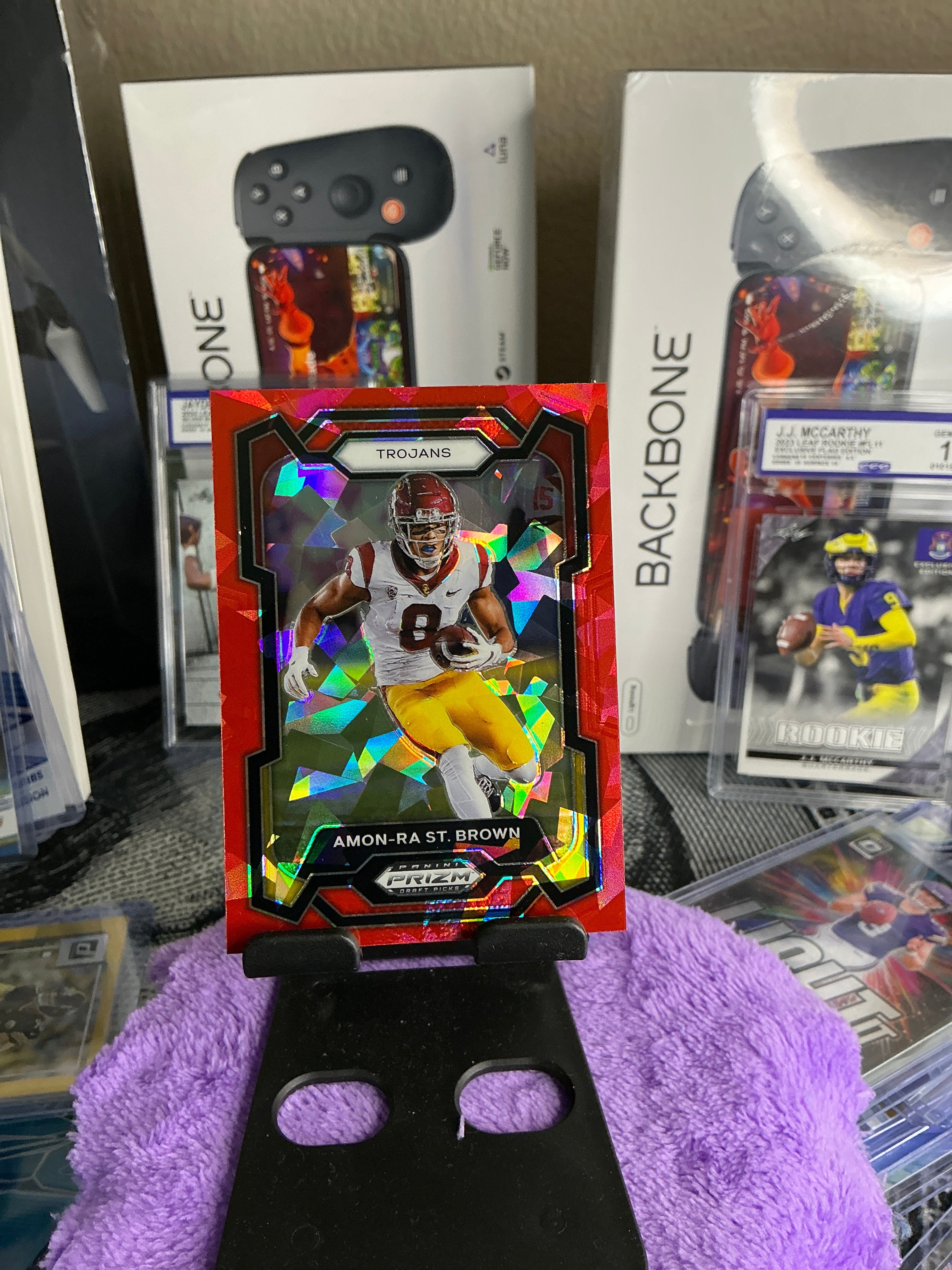 Amon-Ra St. Brown Red Cracked Ice – USC Trojans / Detroit Lions (Prizm Draft Picks)
