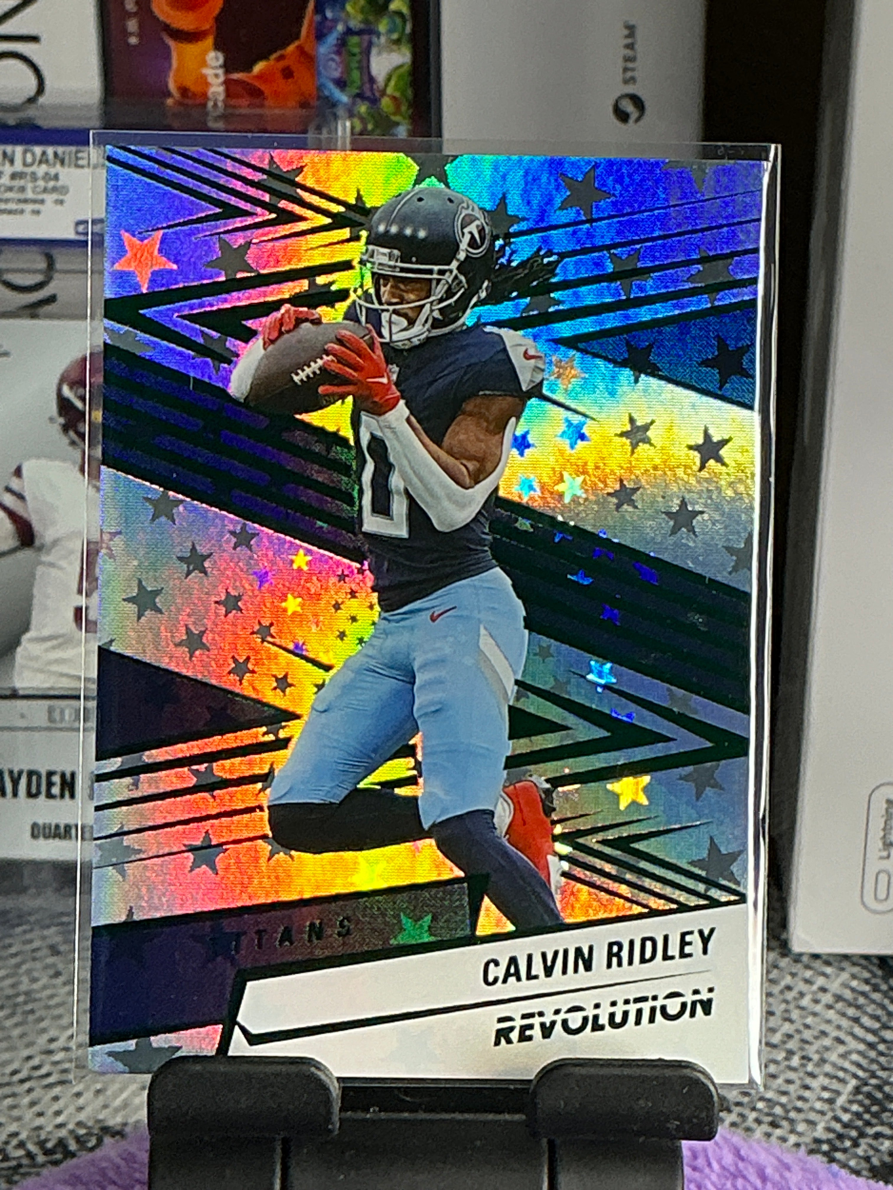 Calvin Ridley Astro Parallel – Serial #223/699 (2025 Panini Revolution – Tennessee Titans)