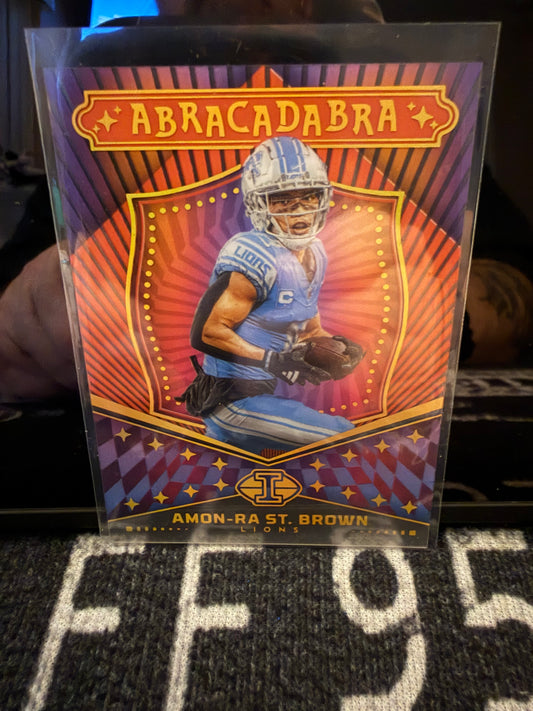 Amon-Ra St. Brown 2024 Panini Illusions Abracadabra Acetate /199 Lions #121/199