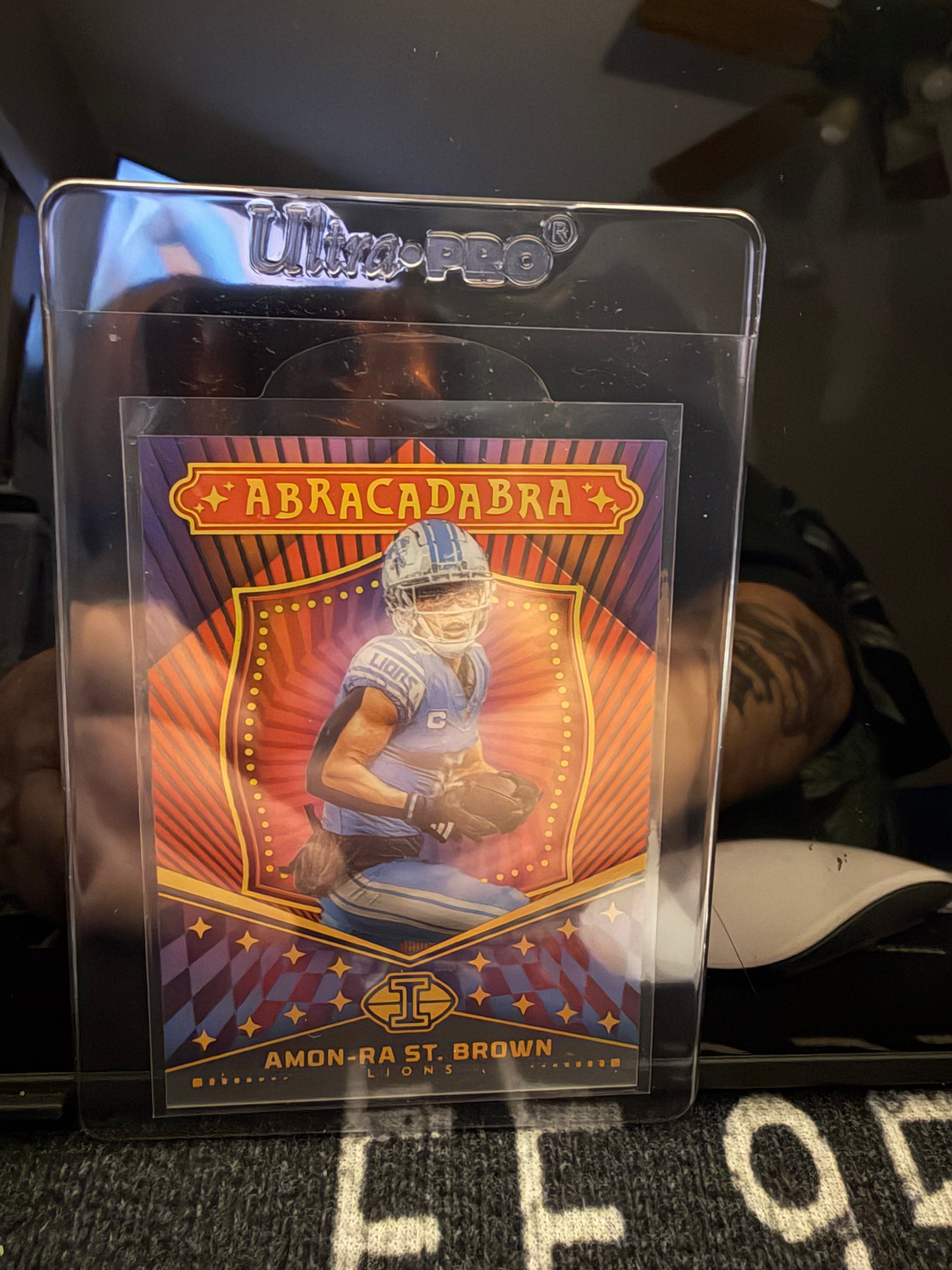 Amon-Ra St. Brown 2024 Panini Illusions Abracadabra Acetate /199 Lions #121/199