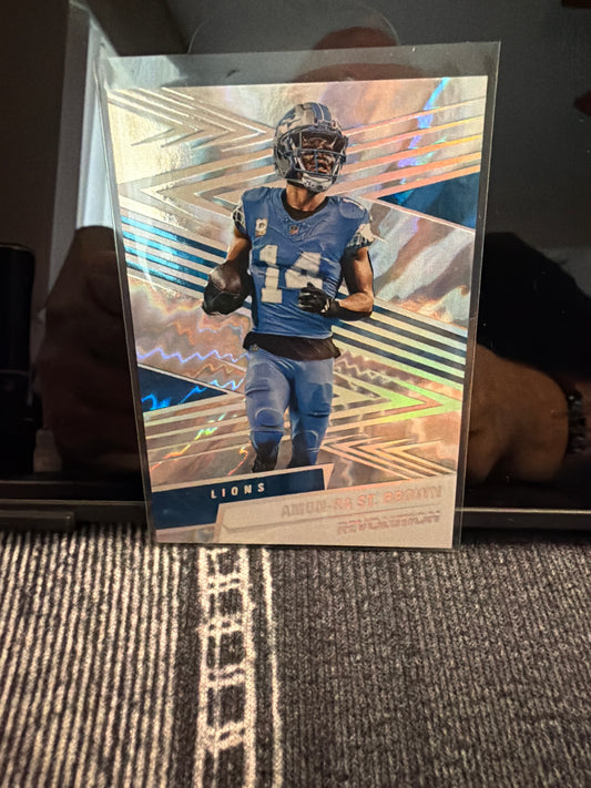 2025 Panini Revolution Amon-Ra St. Brown Lightning Parallel 49/60 Detroit Lions